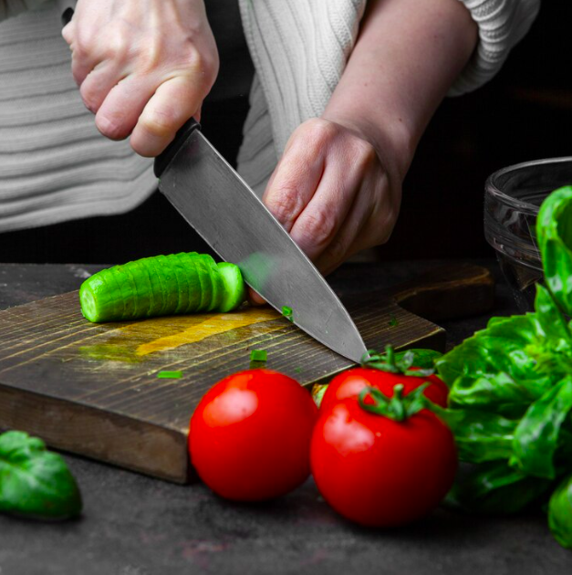 Knife Cutting Vegetablesn